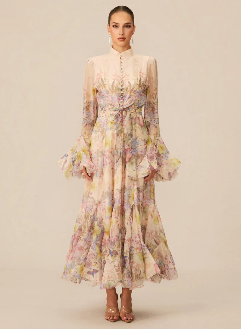 سنفير فستان ماكسي أليسيا بطبعات زهور وأكمام مكشكشة